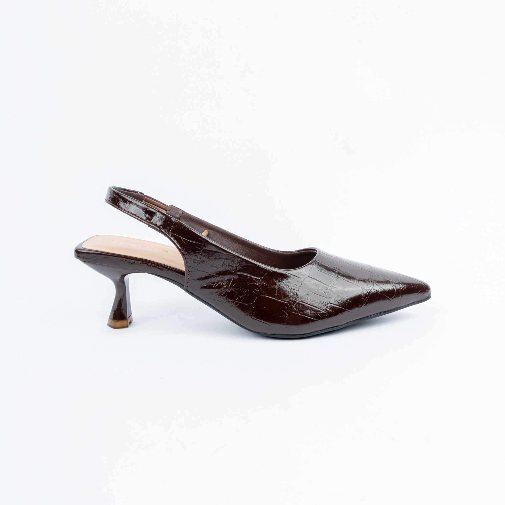 Coffee brown pumps styled for casual wear