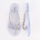 Transparent flat sandals for women, a double scalloped row of iridescent AB crystals running the length of the V-strap and down into the toe post, on a one-piece clear jelly upper with a ribbed moulded footbed