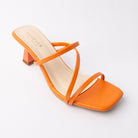 Orange mules for women, side view
