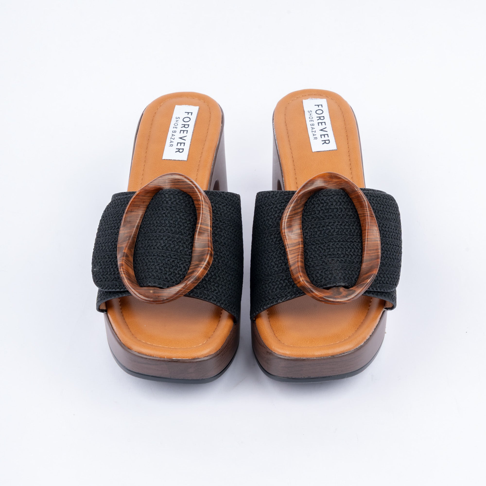 Black platform heel mules styled for casual wear