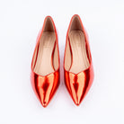 Red pumps styled for party wear