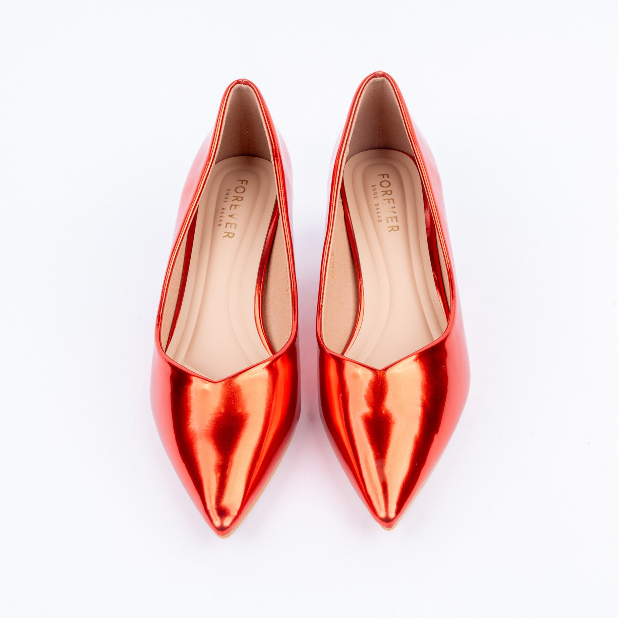 Red pumps styled for party wear