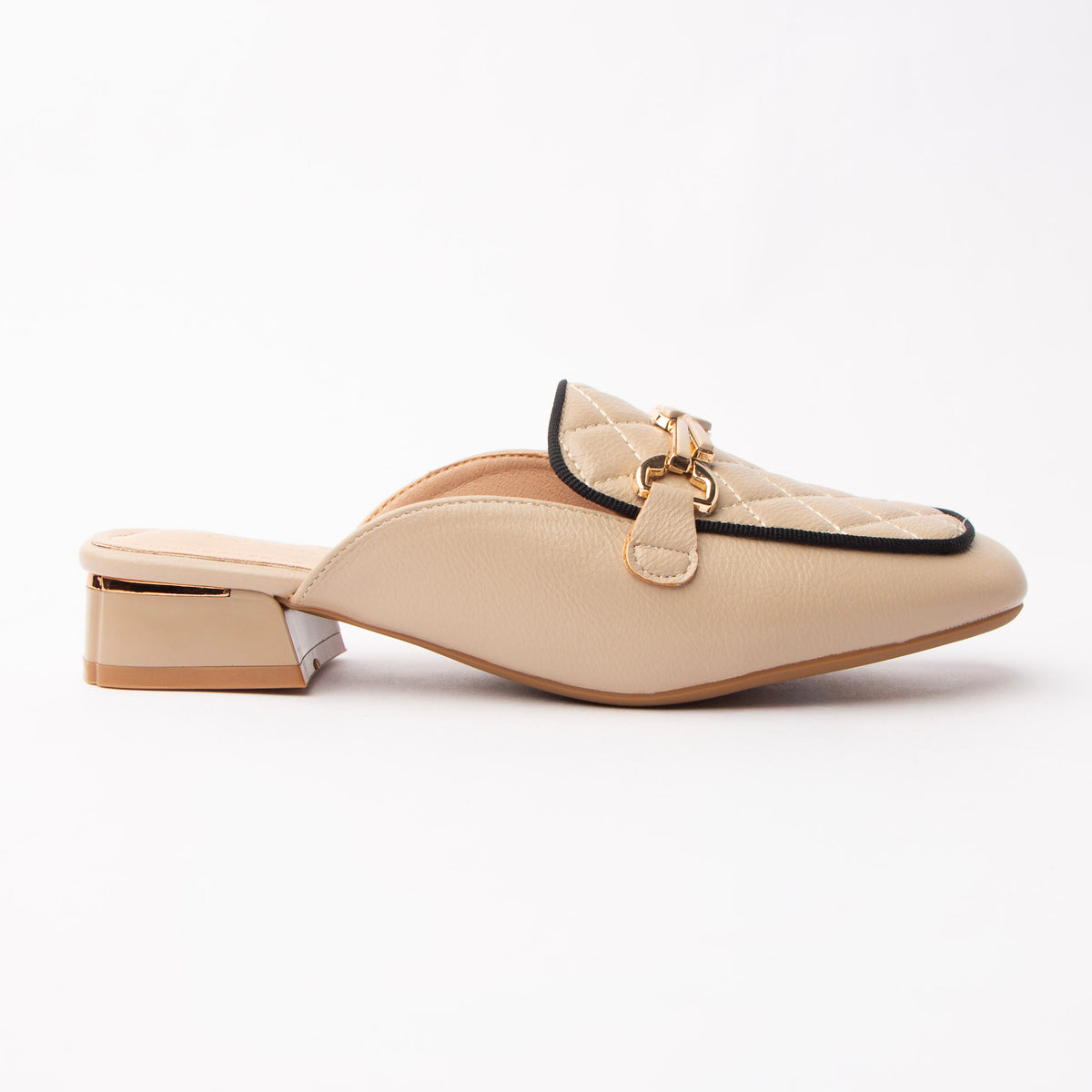 Khaki quilted loafer mules for women, a soft cream loafer mule with a diamond-quilted apron outlined in fine black grosgrain piping, a tonal keeper strap carrying a gold snaffle bar, and a low block heel wrapped with a gold plate above a cream-nude footbed