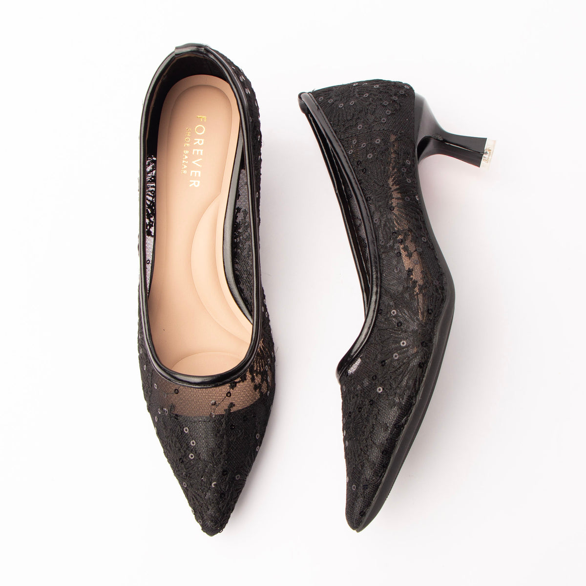 Black embroidered mesh pumps for women, black floral lace scattered with glinting sequins sits over a sheer mesh upper, outlined by high-shine black piping along the topline and back seam with a flared kitten heel and nude cushioned footbed