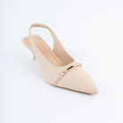 Cream pumps styled for casual wear
