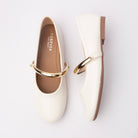 White flats for women, both shoes laid flat