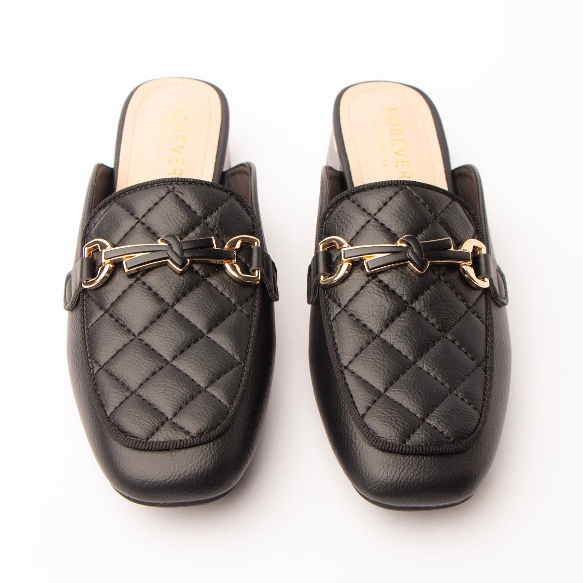 Black quilted loafer mules styled for everyday wear