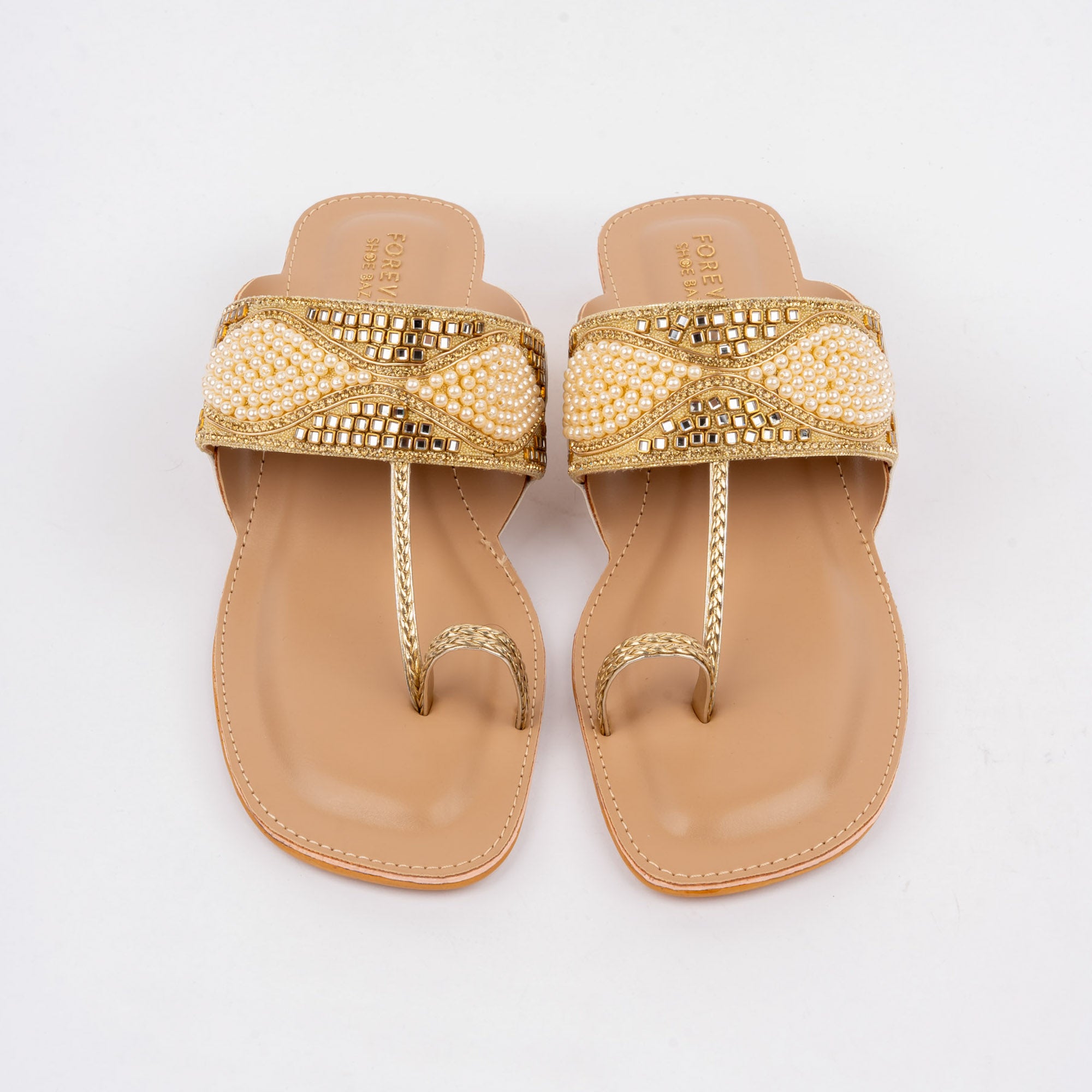 Gold block heel sandals styled for party wear