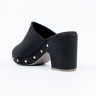 Black platform heel mules for women with cushioned footbed, side view
