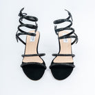 Black block heel sandals for women, two crystal-set straps over the vamp, topped by a coiled spiral ankle wrap studded with the same stones and punctuated by three flat butterfly motifs, on a blush footbed