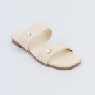Cream flats for women with cushioned footbed, side view