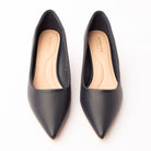 Navy blue pointed kitten heels styled for everyday wear