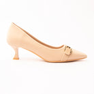 Khaki buckle kitten heels for women, a pale sand-nude matte court, plain and unseamed across the instep, crossed by a narrow tonal band caught in a gold pin buckle, on a low flared kitten heel in glossy nude patent finished with a caramel tip