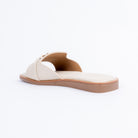 Cream flats for women with cushioned footbed, side view