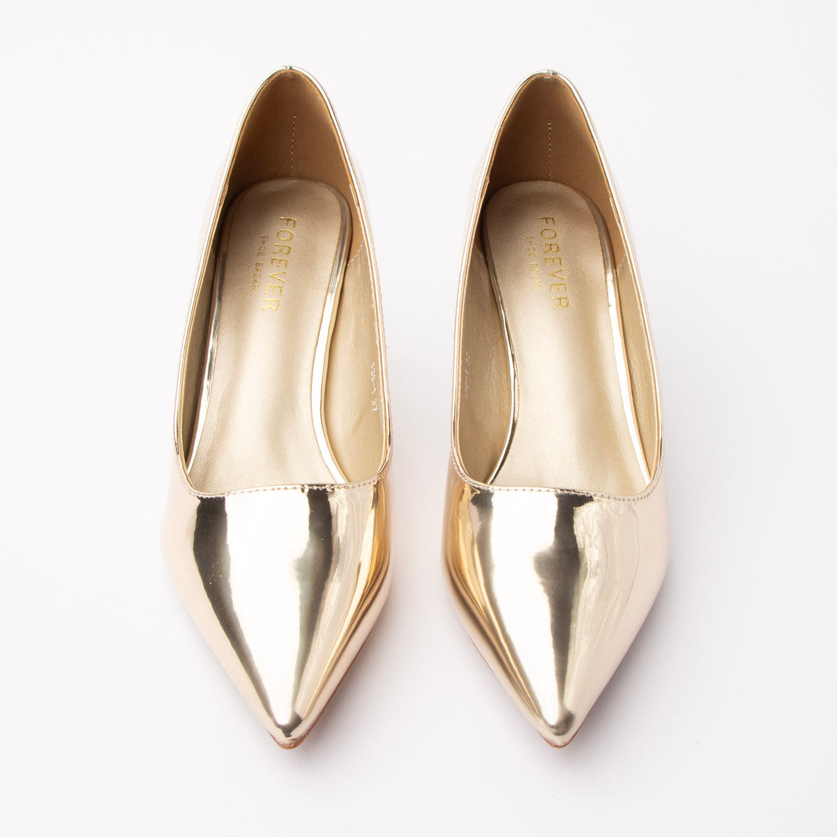Gold pumps for women, both shoes from the front