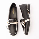 Black piped block heel loafers for women with a cushioned footbed