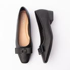 Black pumps for women, both shoes laid flat