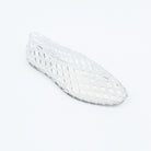Transparent jelly flats styled for casual wear