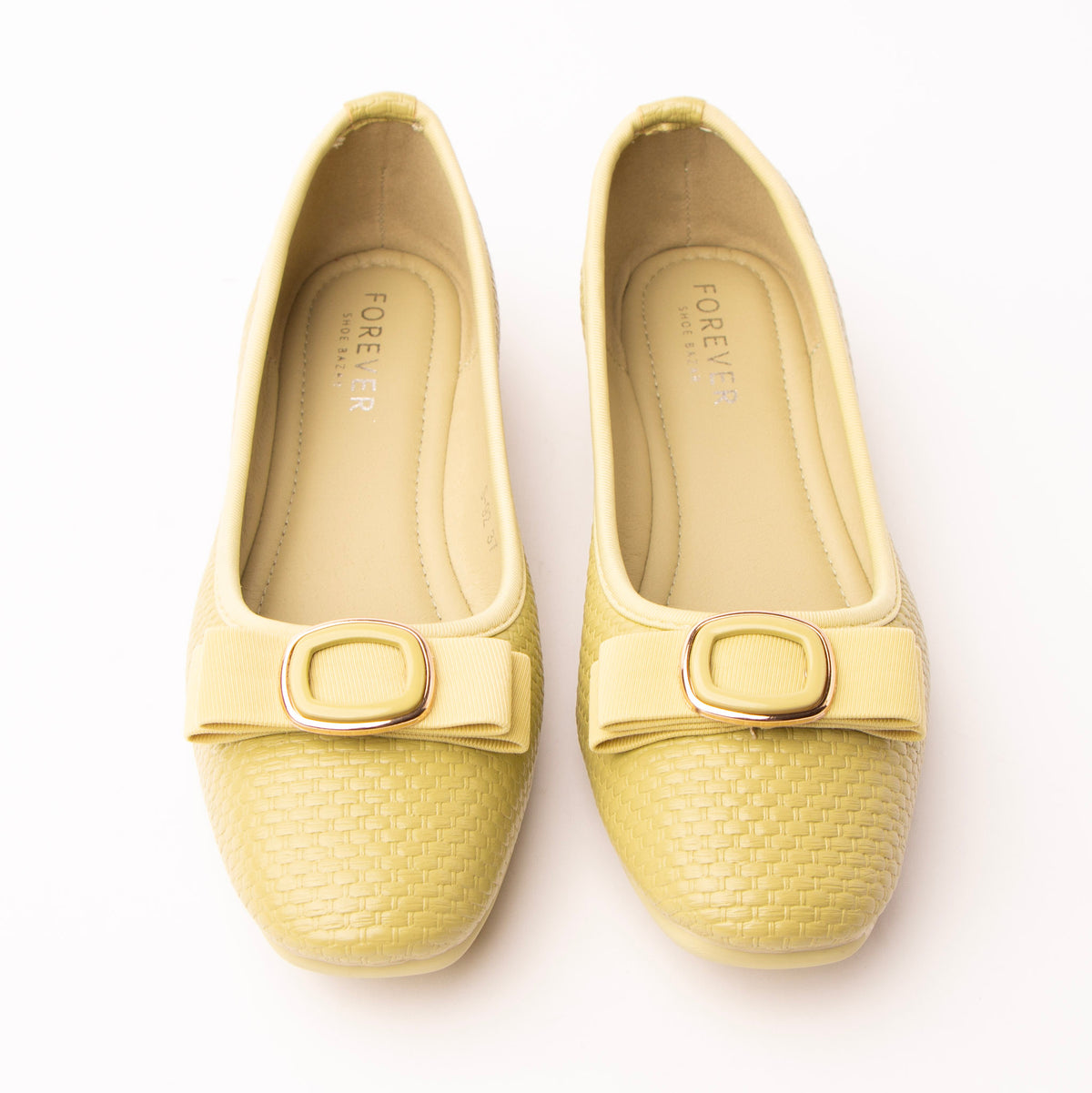 Green woven ballerina flats styled for everyday wear