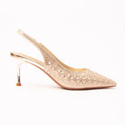 Gold pumps for women, side view