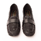 Black lace loafers styled for everyday wear