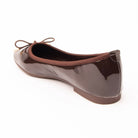 Brown patent ballerina flats for women, back view showing the heel counter