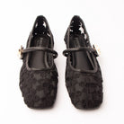 Black flats for women, both shoes from the front