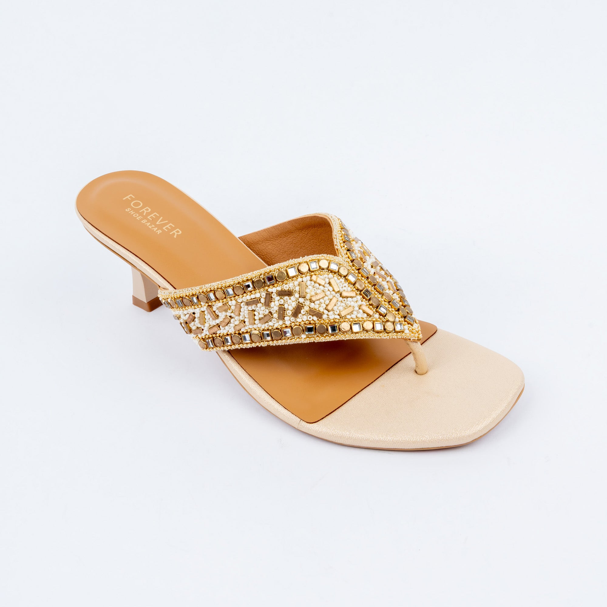 Gold slim heel mules styled for party wear