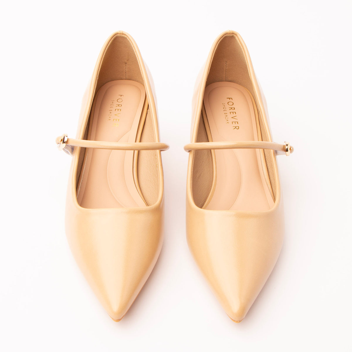 Beige mary jane kitten heels styled for everyday wear