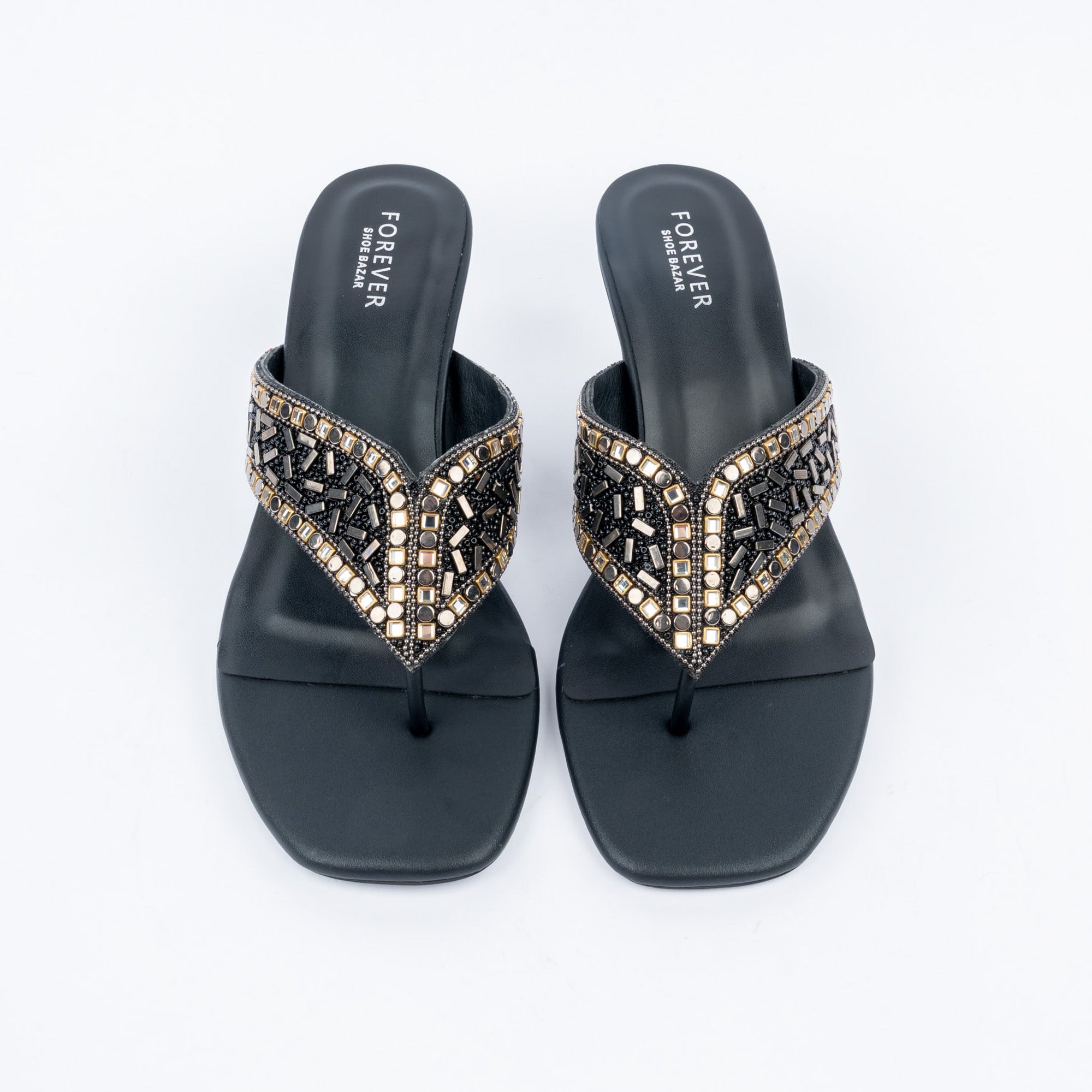 Black slim heel mules styled for party wear