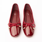 Maroon patent ballerina flats styled for everyday wear