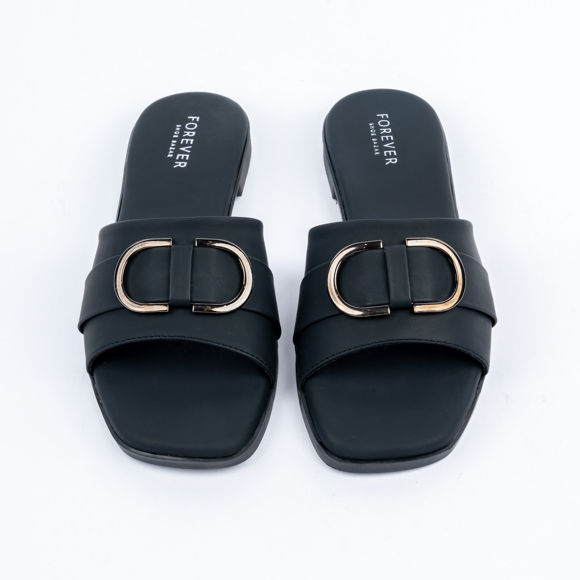 Black buckle ballet flats styled for everyday casual wear