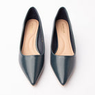 Blue pointed court shoes styled for everyday wear