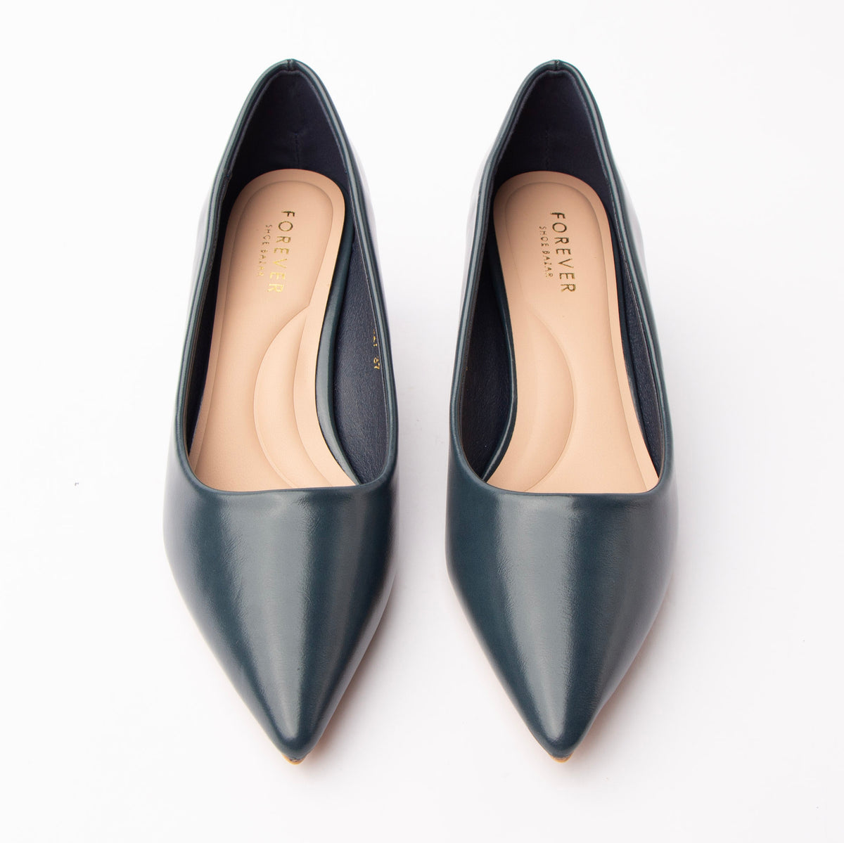 Blue pointed court shoes styled for everyday wear
