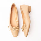 Khaki pumps for women, both shoes laid flat