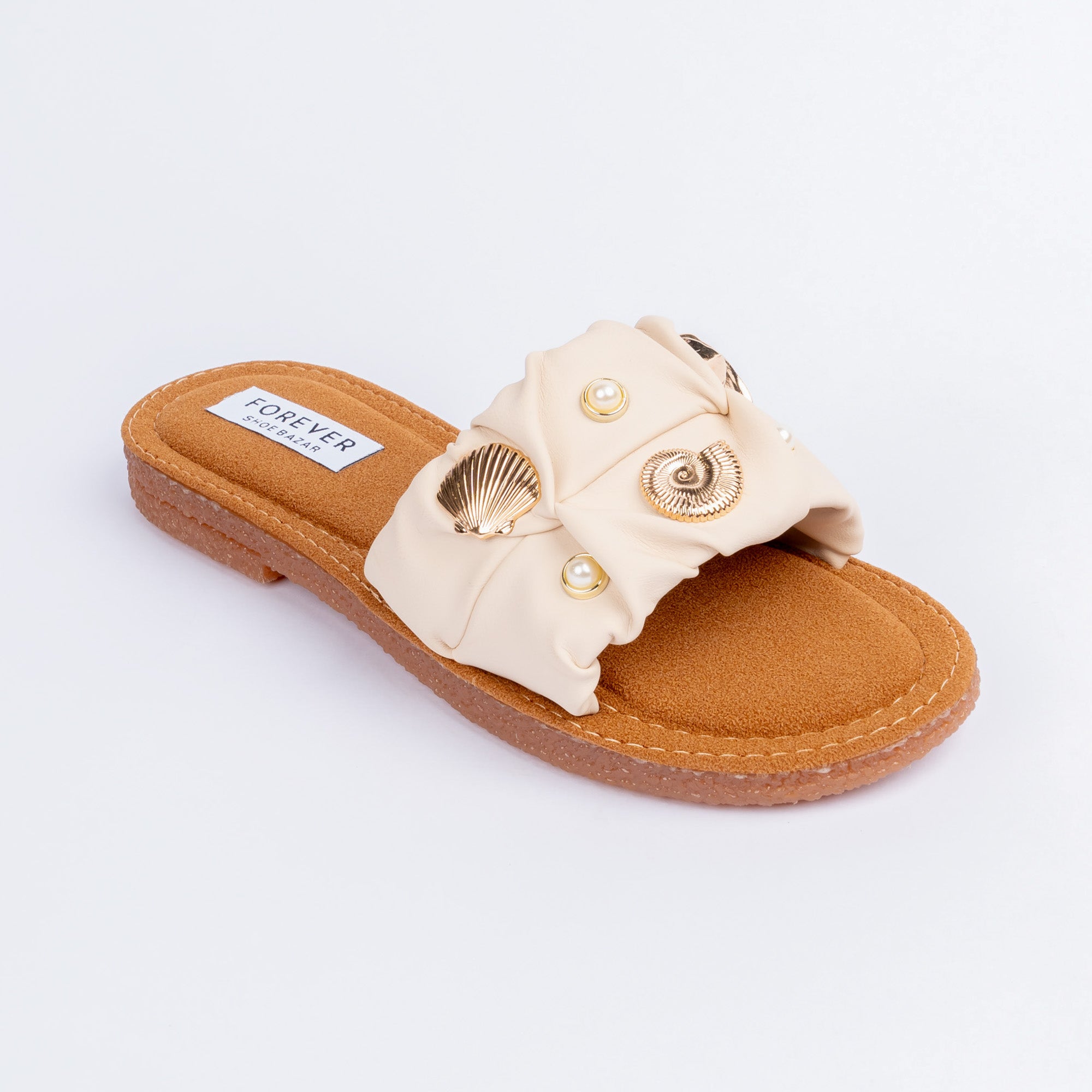 Beige flats for women with cushioned footbed, side view