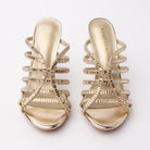 Gold mules for women, both shoes from the front