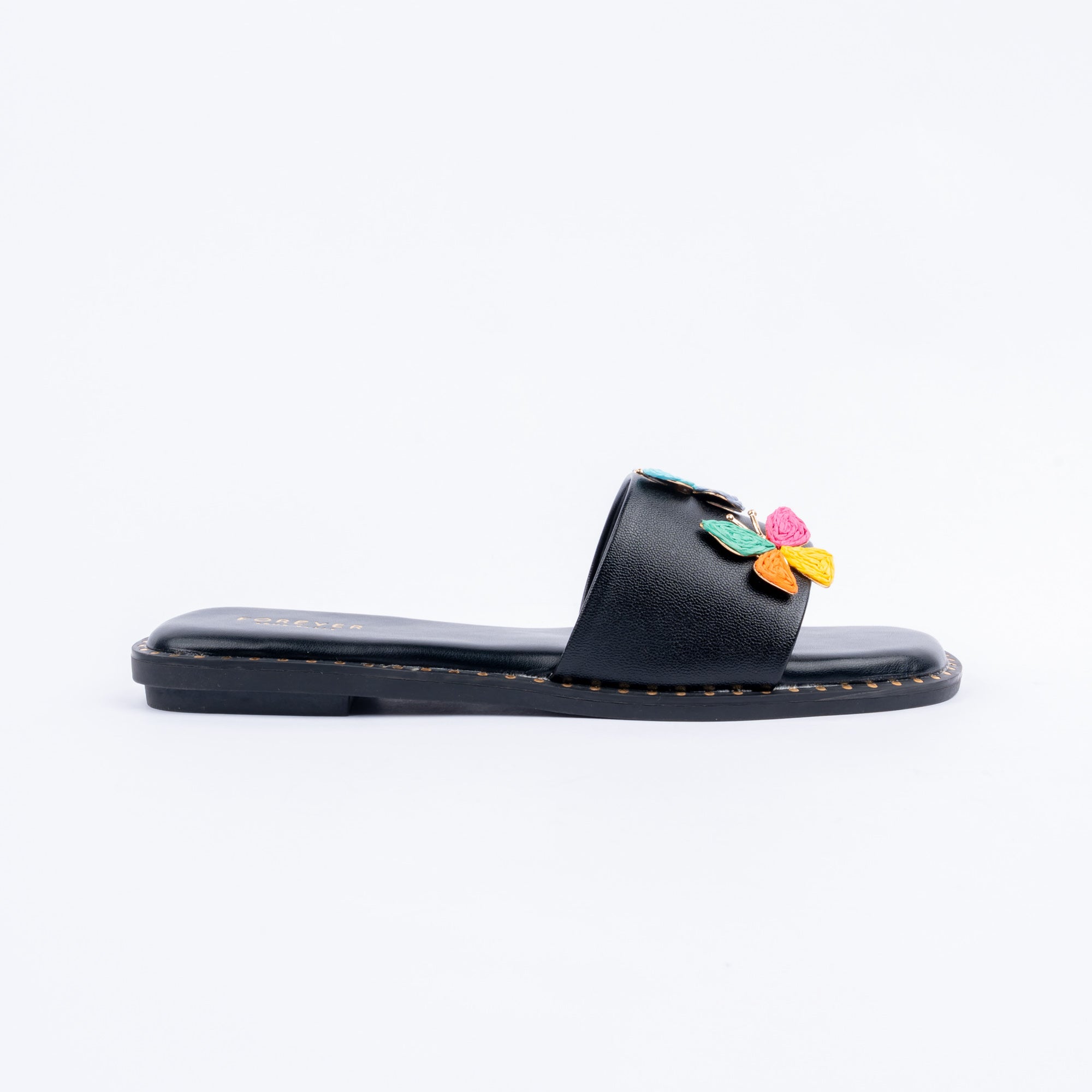 Black butterfly ballet flats styled for everyday casual wear