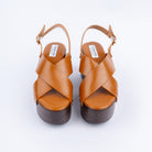 Camel wedge heel sandals styled for casual wear