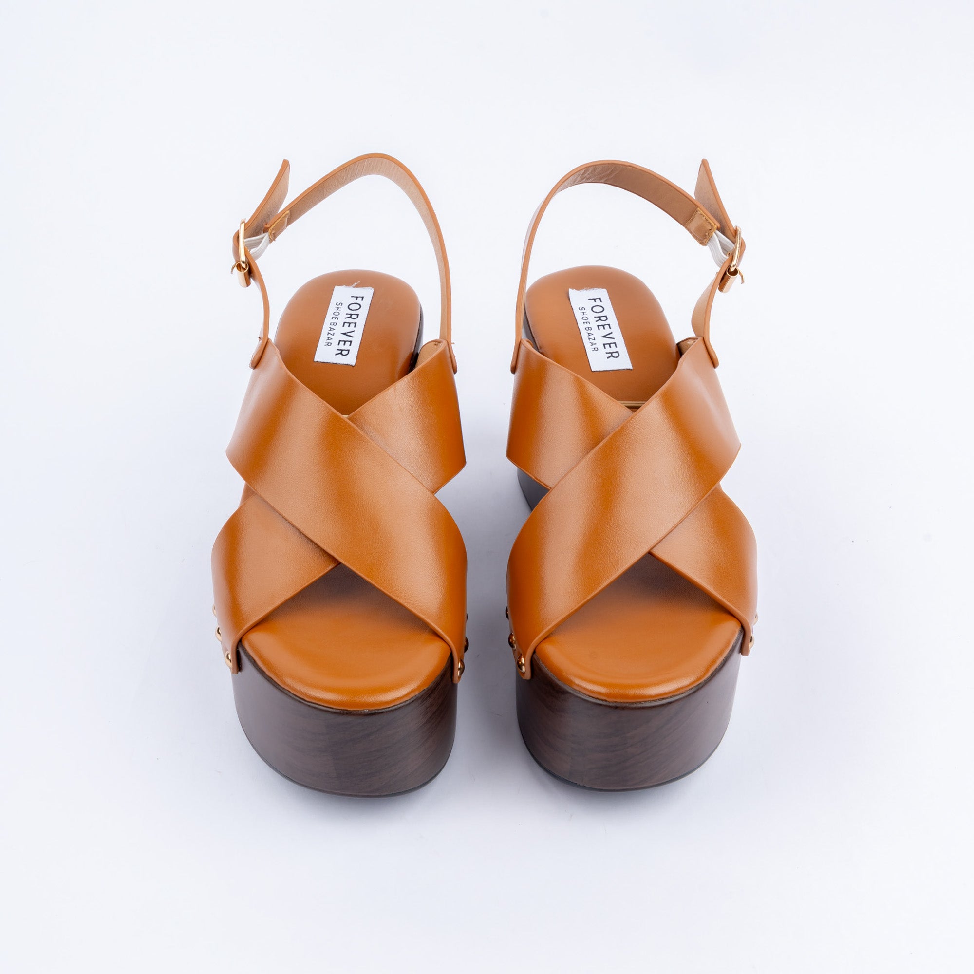 Camel wedge heel sandals styled for casual wear