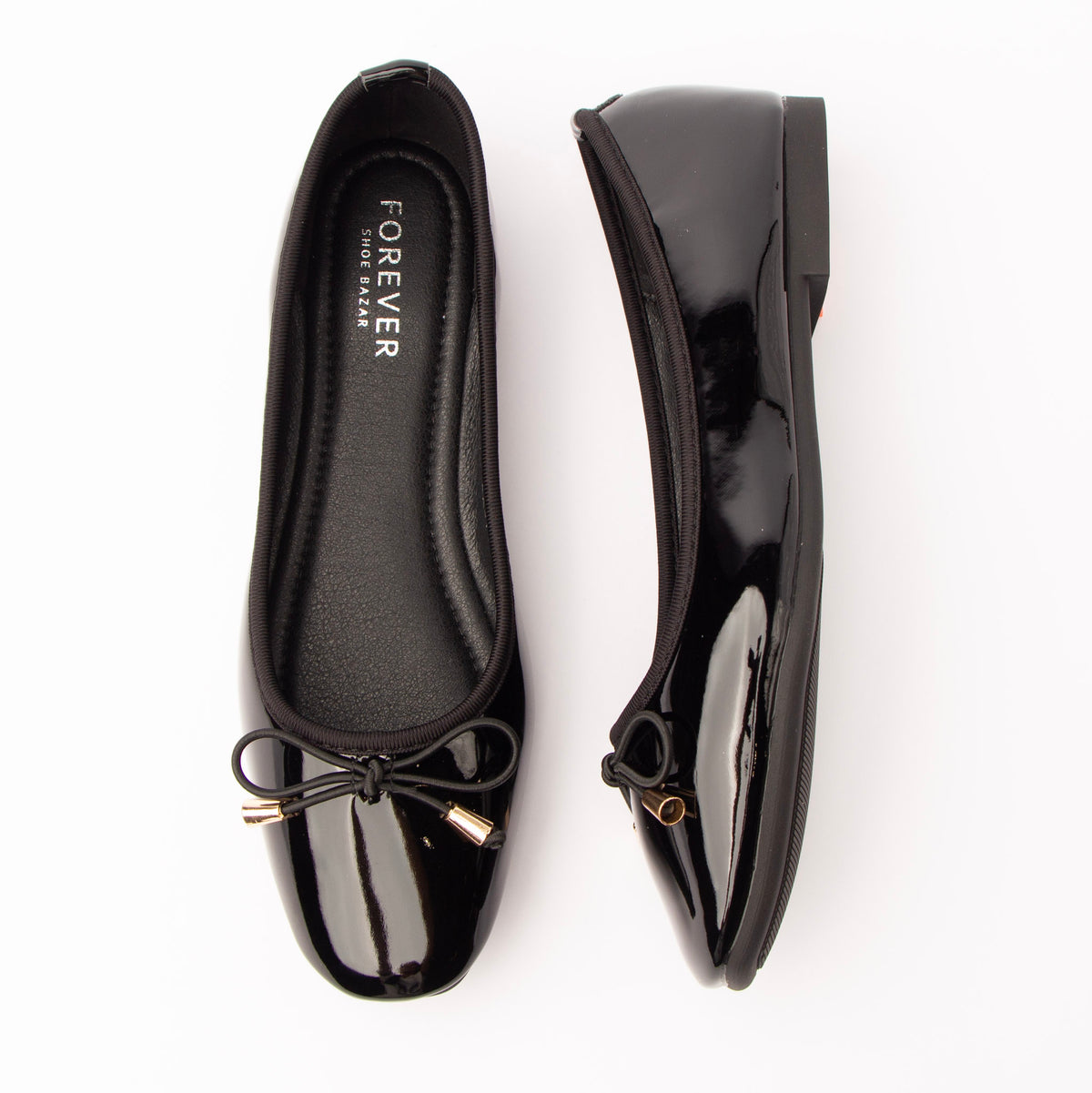 Black patent ballerina flats for women with a cushioned footbed