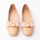 Pink woven ballerina flats styled for everyday wear