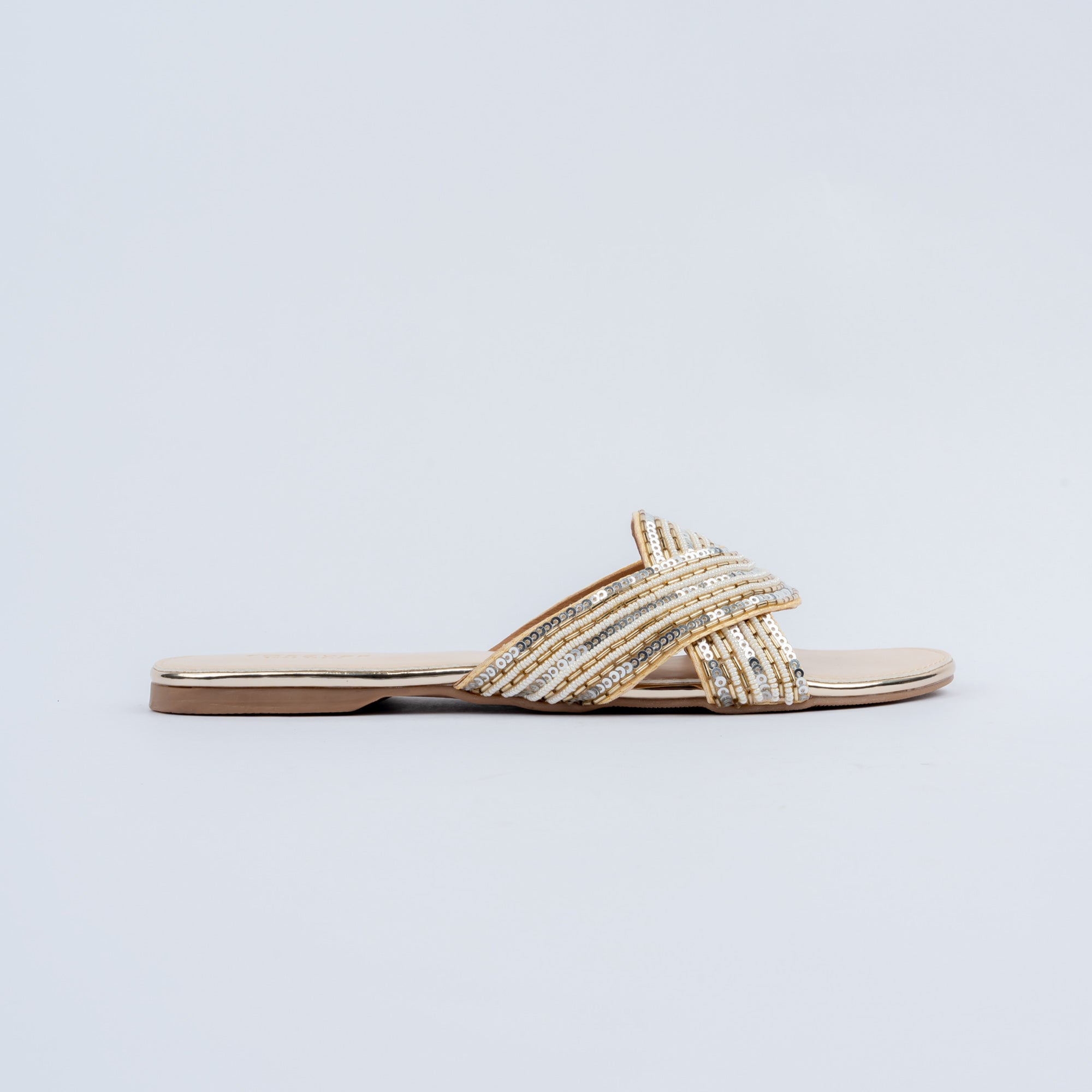 Gold flats for women with cushioned footbed, side view