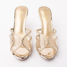 Gold mules for women, both shoes from the front