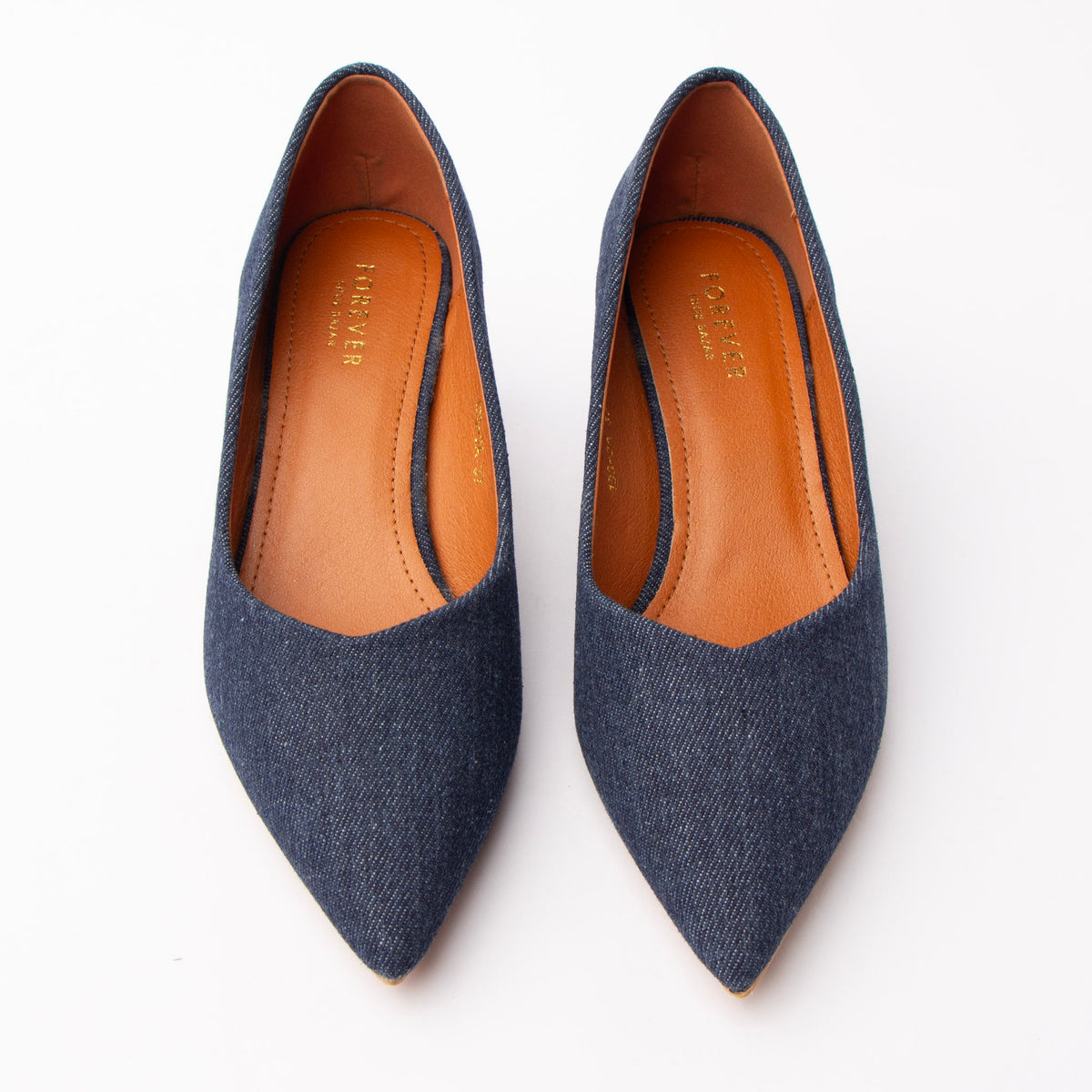 Navy blue denim kitten heels styled for everyday wear