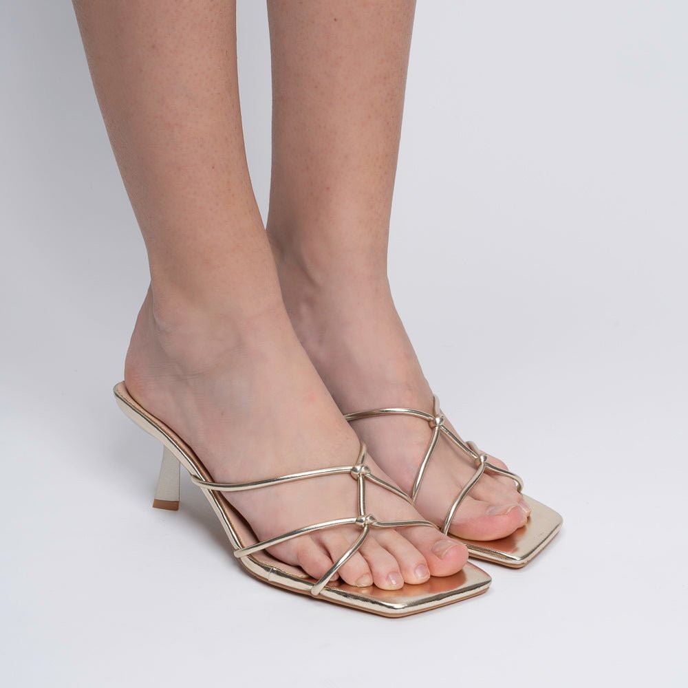 The X-Factor Kitten Golden Strappy Heels — side view | Forever Shoe Bazar