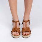 Tan woven wedge sandals for women with buckle ankle strap