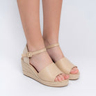 Beige peep-toe platform wedge heels for women with braided woven back strap