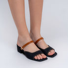 Black denim slip-on block heel mules for women with metallic strap accents