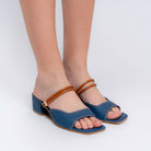 Blue denim slip-on block heel mules for women with metallic strap accents